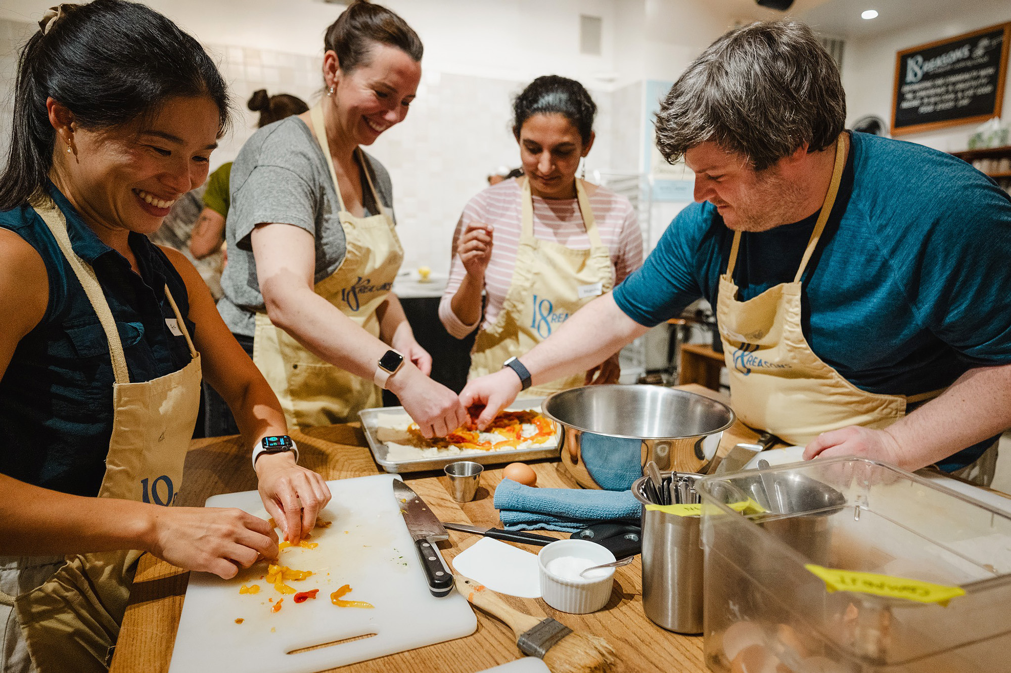 Cooking ingredients and utensils prepared for a hands-on culinary class